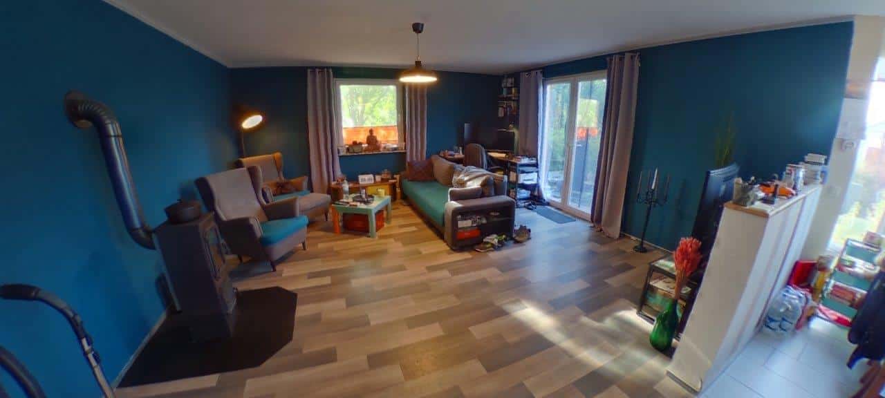 Wohnbereich mit Kaminofen im Bungalow in Stäbelow (Hagebuttenring) – Referenz 5717