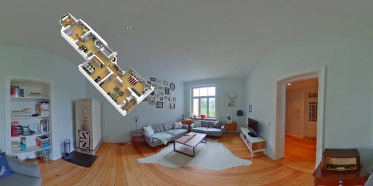Wohnbereich mit Dielenboden und Kachelofen im Bahnhofsviertel Rostock (Georg-Büchner-Straße) – Referenzobjekt 5584 – Büchel Immobilien Rostock