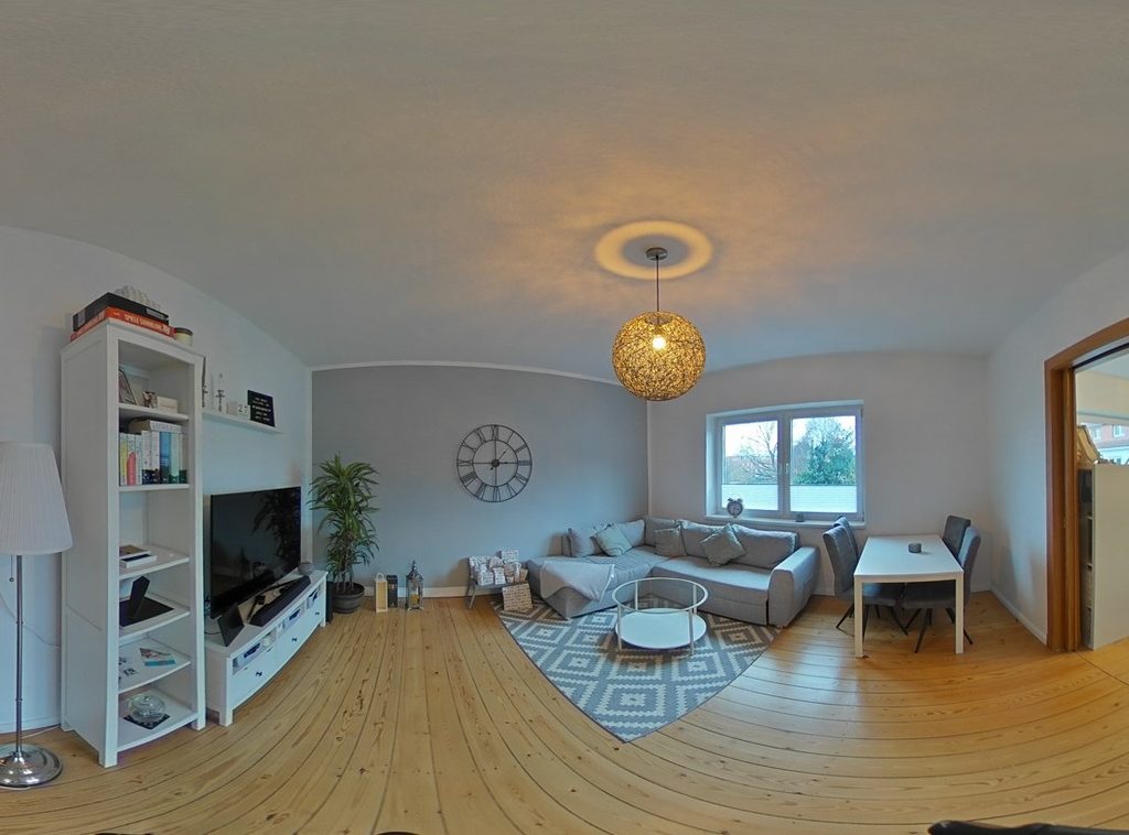 Wohnzimmer mit Holzdielen einer 3-Zimmer-Mietwohnung im Rostocker Tweelviertel (18059) – Referenzobjekt 5786.